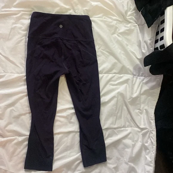 dark purple size 4 lulu lemon capris with mesh at the bottom - Picture 2 of 3